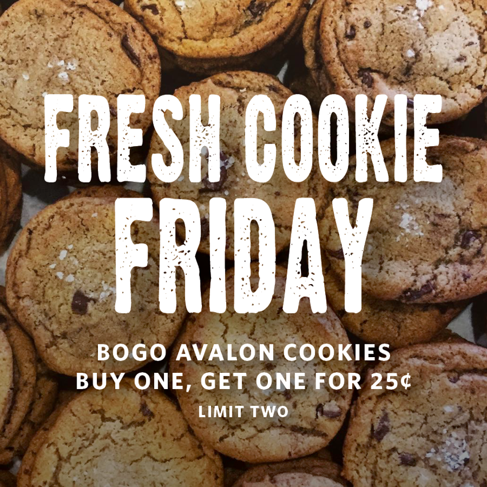 Close-up of chocolate chip cookies with text advertising Fresh Cookie Friday and a buy-one-get-one offer.